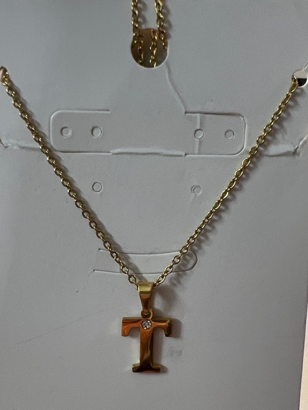 Gold-tone Cross Pendant Necklace with Clear Stone